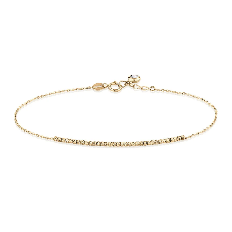 Bracelet with diamond simulant in 10 carat yellow gold