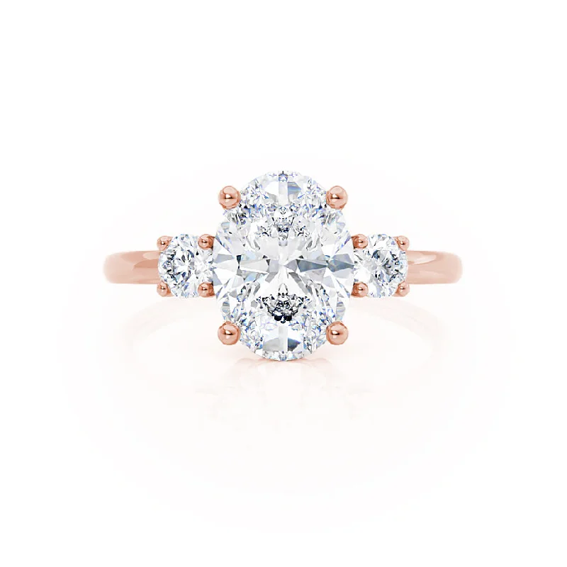 LOUELLA - Moissanite Oval Petite Trilogy Engagement Ring 18k Rose Gold