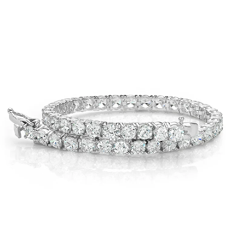 Round Brilliant tennis bracelet with 11 carats* of diamond simulants in 10 carat white gold