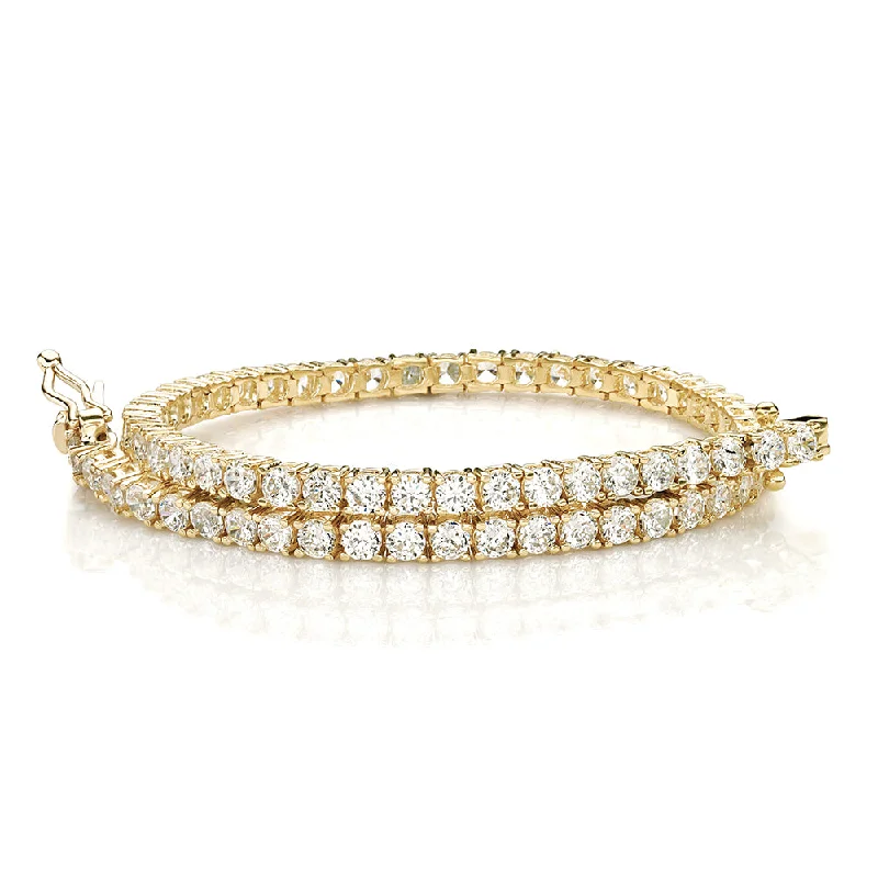 Round Brilliant tennis bracelet with 4.02 carats* of diamond simulants in 10 carat yellow gold